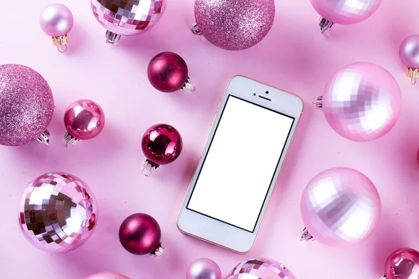 Christmas decorations on pink — Stock Photo, Image