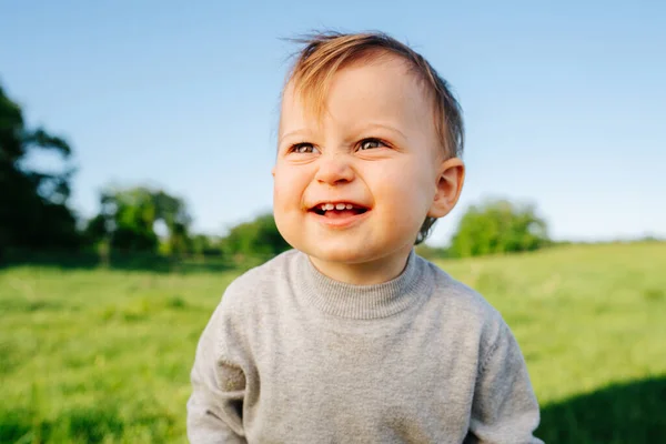 Close Portrait Baby Boy Countryside Has Weird Face Expression Blurred — Stock Photo, Image