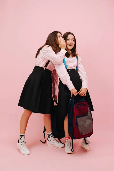 Beautiful Little Twin Schoolgirls Happily Posing Backpacks Looking Camera Low — Stock Photo, Image