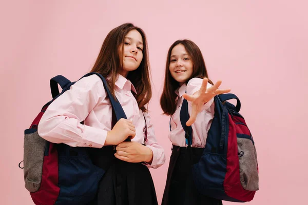 Beautiful Little Twin Schoolgirls Happily Posing Backpacks Looking Camera Low — Stock Photo, Image