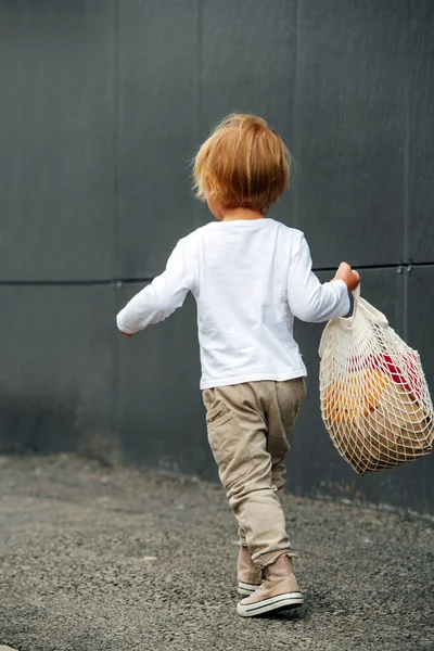 Little Boy Blond Hair Carrying Net Bag Fresh Crispy Bread — Stock Photo, Image