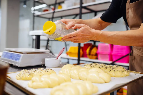 Male Baker Sprinkling Raw Uncooked Bread Poppy Seeds Cropped Head — Stock Photo, Image