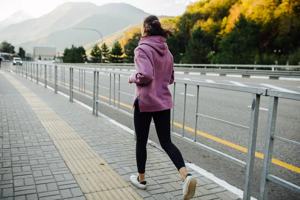 Young Woman Running Away Sidewalk Steel Rail Barrier Mountain Highway — Stock Photo, Image