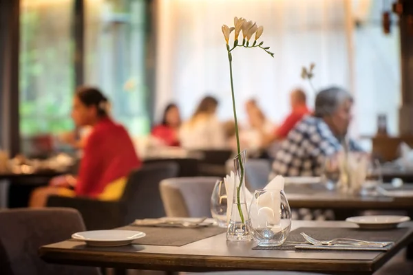 Table for two waiting for guests in a restaurant. close view.