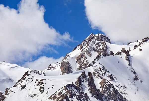 Snow summit in high mountain range of Zaili Alatay in Almaty, Kazakhstan