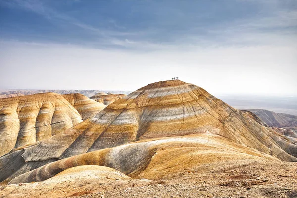 Tourist Silhouettes Top Surreal Yellow Mountain Desert Park Altyn Emel — Stock Photo, Image