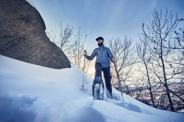 Happy Hiker Beard Snowshoes Winter Forest Blue Sky Background — Stock fotografie