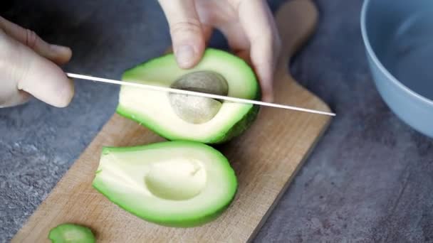 Woman cooking avocado — 비디오