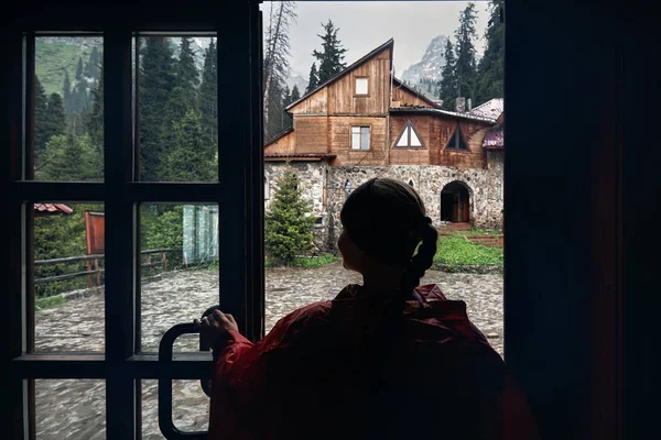 Woman in mountain hotel — Stock Photo, Image