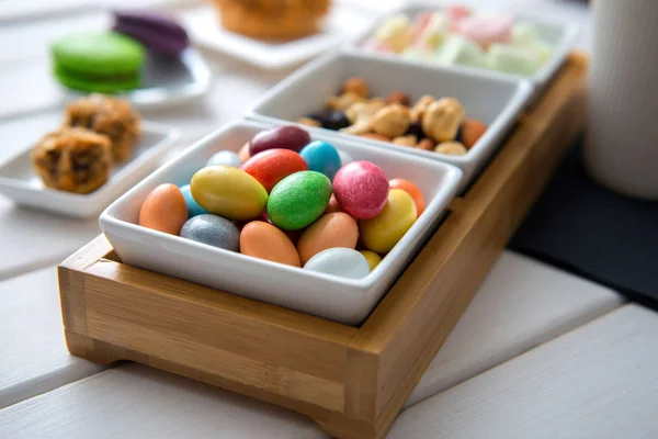 Different color sweets on bowl — Stock Photo, Image