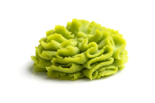 Porção de wasabi em um barco de molho branco. — Fotografia de Stock