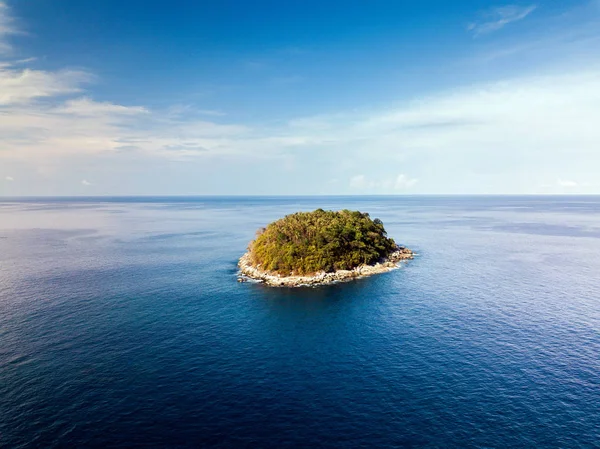 Little uninhabited island in ocean