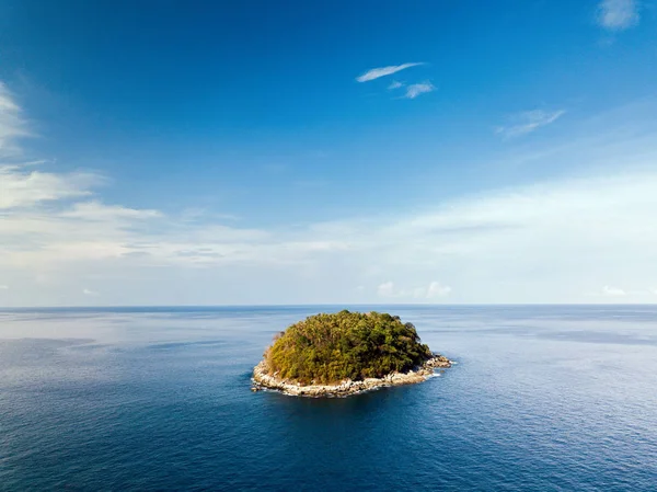 Little island in ocean.