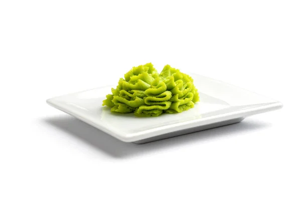 Portion of wasabi in a white gravy boat. — Stock Photo, Image
