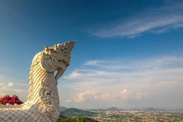 Dragon snake statue near big buddha temple