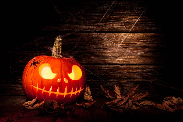 Halloween-Kürbiskopf-Buchse auf Holz-Hintergrund — Stockfoto