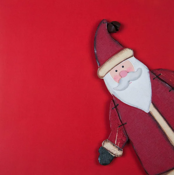 Tarjeta de Navidad en rojo con santa — Foto de Stock