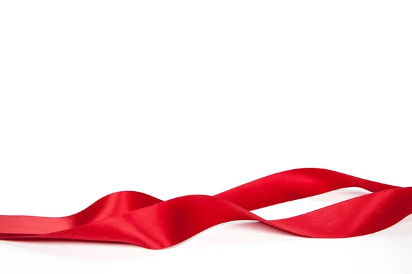 Red ribbon on a white background. Isolated — Stock Photo, Image