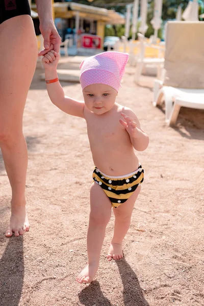 Girl Goes Hand Hand Her Mother Large Sand Public Beach Royalty Free Stock Photos