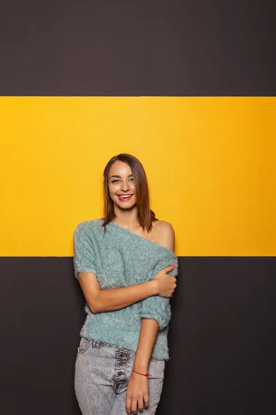 Pretty young lady fooling around in studio — Stock Photo, Image