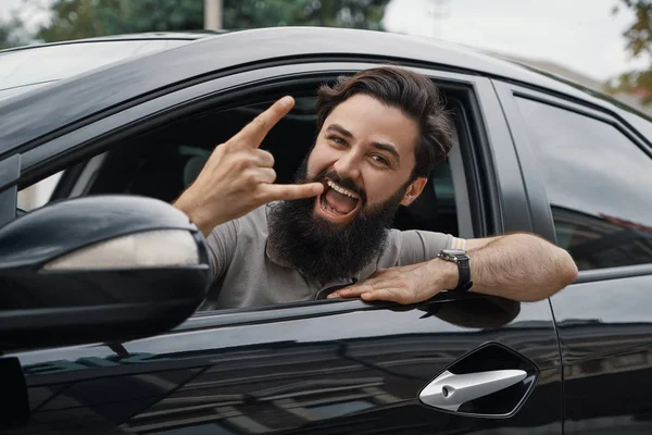 Close up side portrait of happy man driving car — Stock Photo, Image