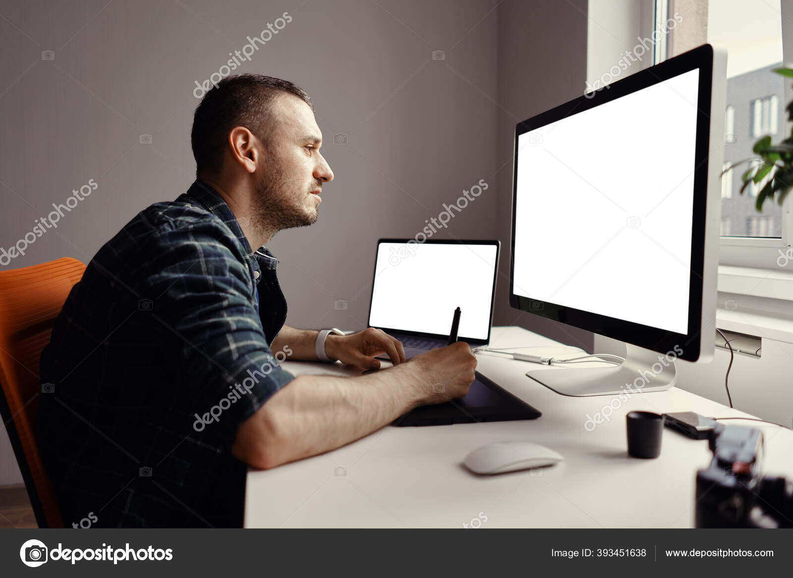 Young man working with interactive pen display and computer — Stock Photo ©  arthurhidden #393451638, image size:1600x1167