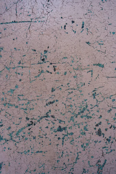 Derisi soyulmuş metalin sıkıntılı örtülü dokusu. Grunge arkaplanı.