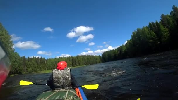 River rafting kayaking. Overcoming water rapids by boat. Rowing paired paddle. Extreme sports. Water sports. Shooting Action camera. — Stock Video