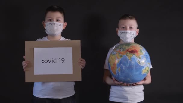 Boy Holds Globe Model Planet Earth Child Holding Sign Inscription — Stock Video