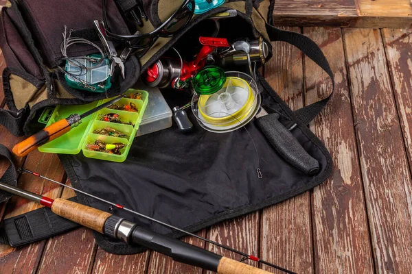 Different Fishing Tacles Rod Reels Wooden Brown Background Mockap Advertisment — Stock Photo, Image