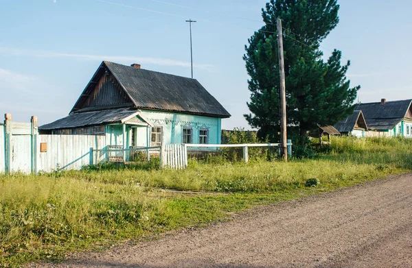 Dirt road in a russian village — Stock Photo, Image