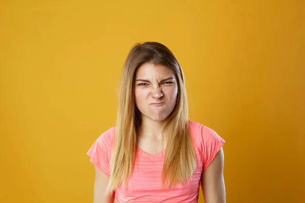 Beauty portrait of young adorable fresh looking angry blonde woman — Stock Photo, Image