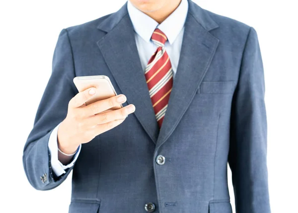 Affärsman Kostym Som Innehar Smartphone Över Vit Bakgrund — Stockfoto