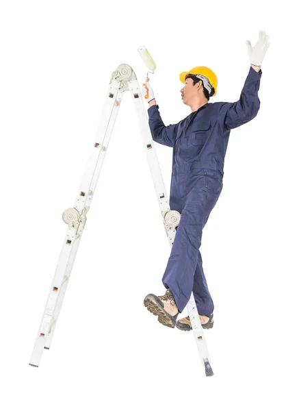 クリッピング パスと白い背景に制服直立はしごのペイント ローラーを使用している間若い便利屋素材分離 — ストック写真