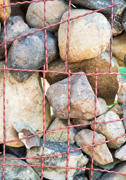 The fence of the wall made of stone