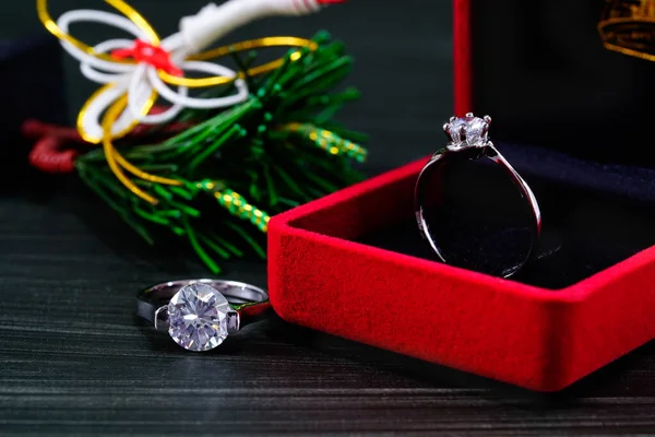 Close up diamond ring in red jewel box