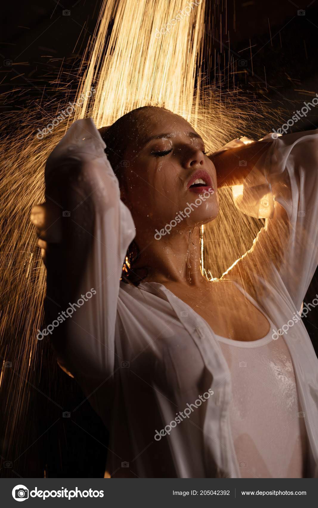 Wet Woman In White Shirt Photos