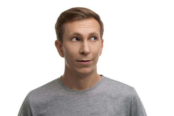 Young male in simple gray t-shirt isolated portrait — Stock Photo, Image