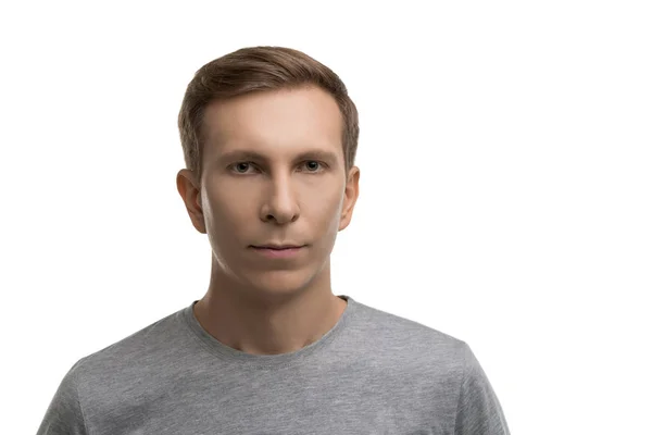 Resolute male in gray t-shirt isolated portrait — Stock Photo, Image