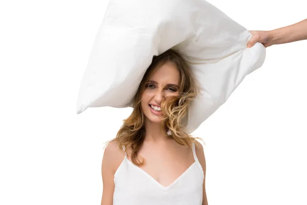 Girl hitted on her head with a pillow isolated shot — Stock Photo, Image