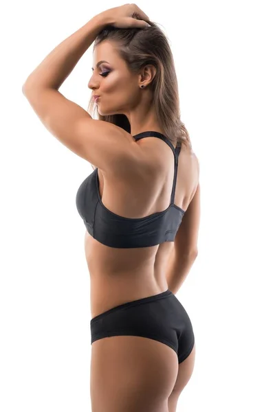 Bronzé fille sexy en sous-vêtements de sport vue arrière — Photo