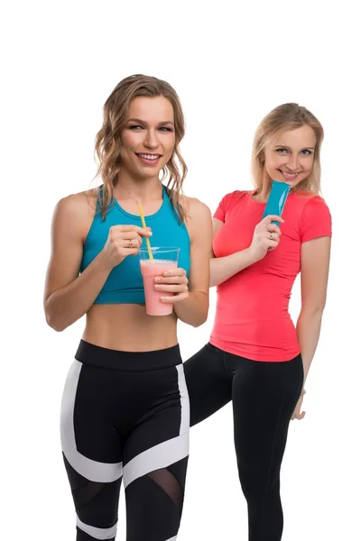 Fitness models with water bottles isolated shot — Stock Photo, Image