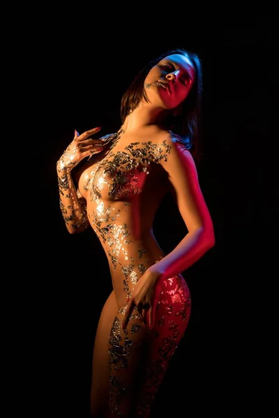 Femme nue avec du bodyart d'or recadré coup — Photo
