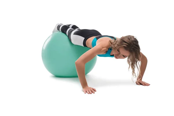 Blonde doing fitness on fitball isolated shot — Stock Photo, Image