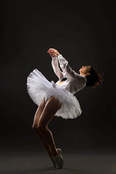 Slim brunette in ballet tutu dancing — Stock Photo, Image