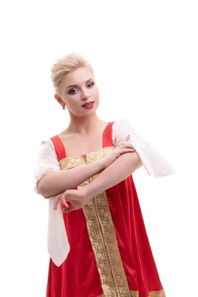 Beautiful blond model in traditional sarafan dress — Stock Photo, Image
