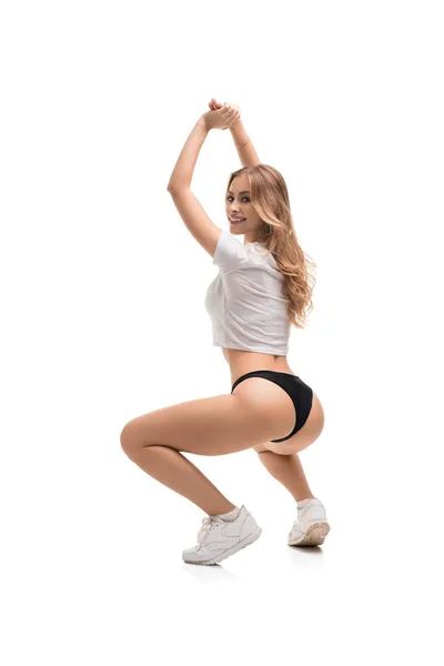 Sexy sporty blonde exercising isolated shot — Stock Photo, Image