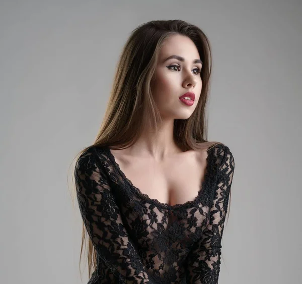 Foto av vacker modell i svart spets bodysuit — Stockfoto