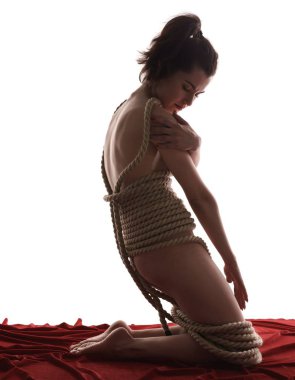 Esaret cinsel fetiş olarak. Çıplak kız ile ip bağladılar