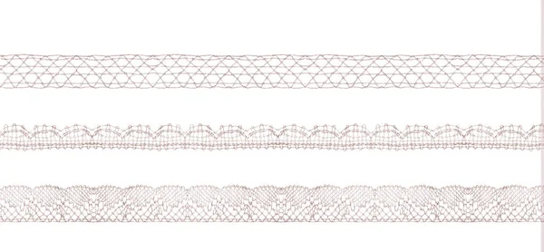 Thin lace ribbons isolated shot — Stock Photo, Image